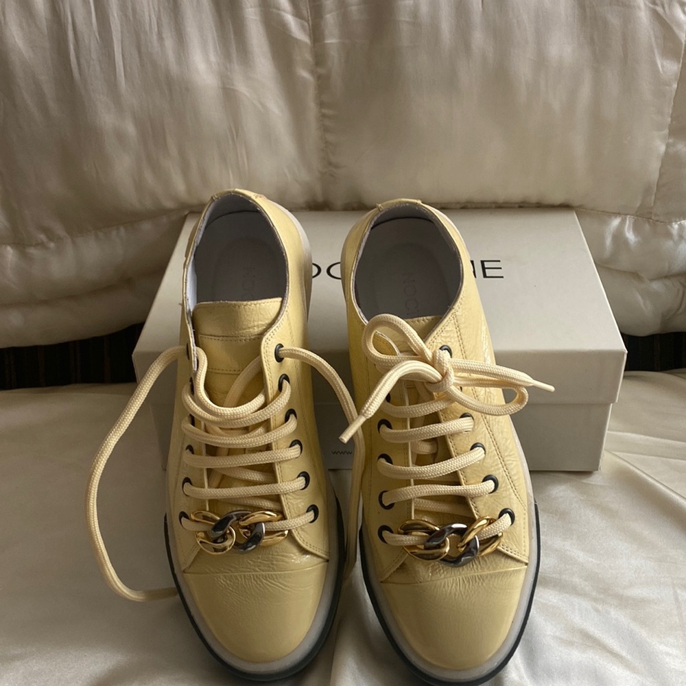 Trendy sneakers light yellow color, very soft leather inside, Patent leather top